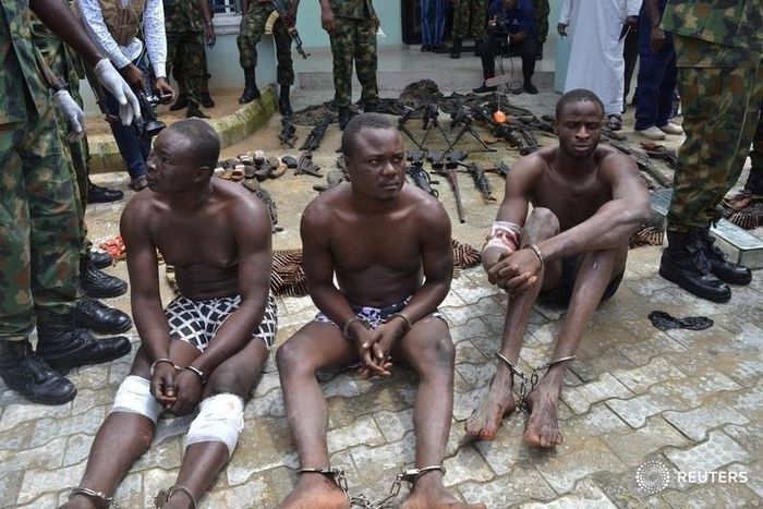 Suspected members of the Niger Delta Avengers are seen as they are paraded by the Nigeria military after their arrest in the Nembe waters, Rivers, Nigeria, August 22, 2016. Photo taken August 22, 2016