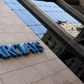 A Barclays logo is pictured outside the Barclays towers in Johannesburg December 16, 2015. REUTERS/Siphiwe Sibeko