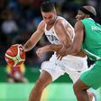 D'Tigers baller attacks Lithuania opponent during their second game at the Rio 2016 Olympics.