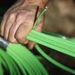 A NBN Co worker arranges fibre-optic cables used in the National Broadband Network in west Sydney July 11, 2013. REUTERS/Daniel Munoz