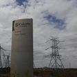 Pylons carry electricity from a sub-station of state power utility Eskom outside Cape Town in this picture taken March 20, 2016.