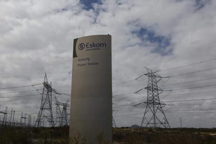 Pylons carry electricity from a sub-station of state power utility Eskom outside Cape Town in this picture taken March 20, 2016.
