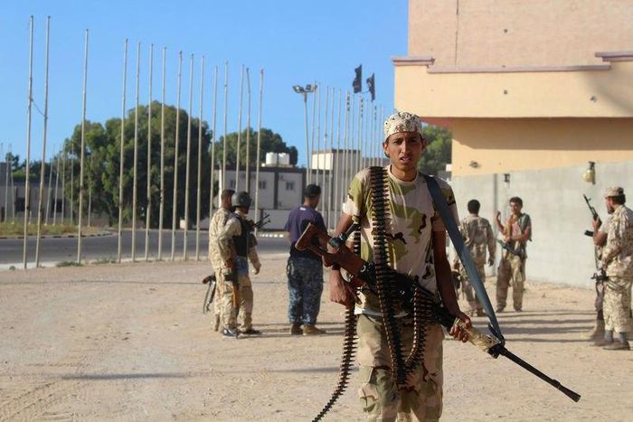 Soldiers from forces aligned with Libya's new unity government are seen on a road during an advance on the Islamic State stronghold of Sirte, June 8, 2016.