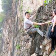 Daring couple hangs from rocks for their pre-wedding shoot