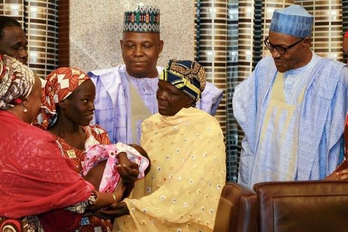 Amina Ali Darsha Nkeki, a Nigerian schoolgirl rescued after over two years of captivity with BokoHaram militants, presents her child to President Muhammadu Buhari in Abuja, Nigeria May 19, 2016.