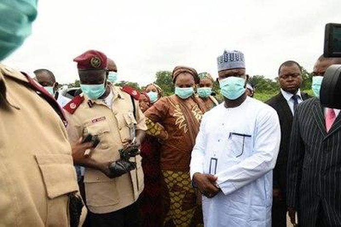 Governor Yahaya Bello's convoy at the scene of the accident as well as road safety officials