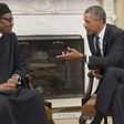 US President Barack Obama speaks with his Nigerian counterpart Muhammadu Buhari during a 2015 meeting at the White House