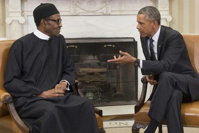 US President Barack Obama speaks with his Nigerian counterpart Muhammadu Buhari during a 2015 meeting at the White House