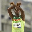 Ethiopia says Olympic marathon medalist a "hero", forever welcome back home