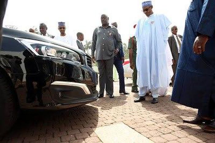 President Buhari inspecting ‘Made-In-Nigeria’ Peugeot car
