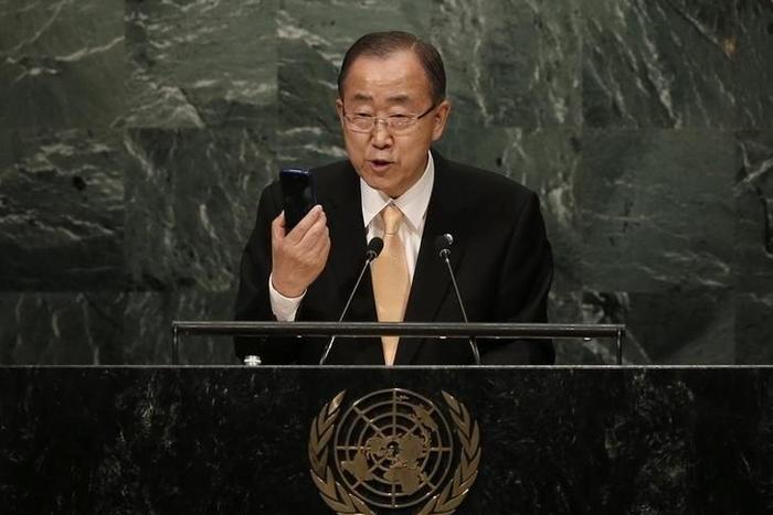 United Nations Secretary General Ban Ki-moon holds up a smart phone as he addresses the General Debate of the 71st Session of the United Nations General Assembly in the Manhattan borough of New York, U.S., September 20, 2016.