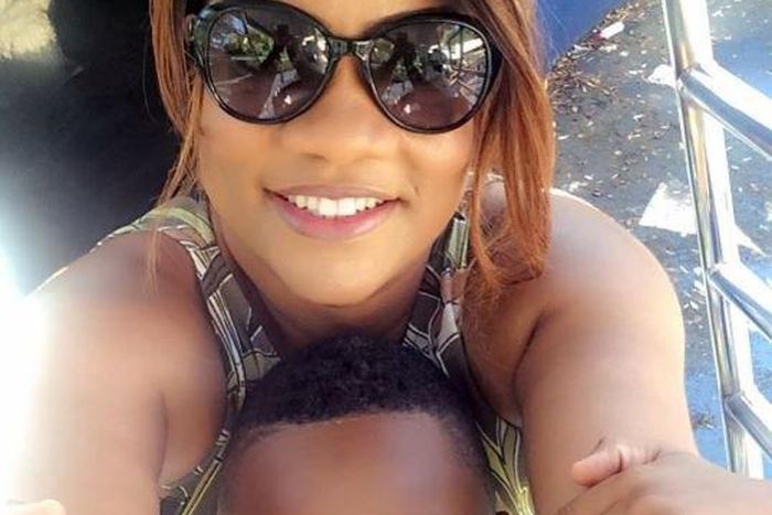 Opeyemi Aiyeola and son