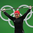 Egypt's Sara Ahmed competes during the women's 69kg weightlifting competition at the Rio Olympic Games on August 10, 2016 