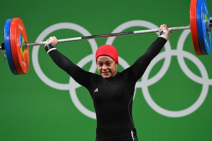 Egypt's Sara Ahmed competes during the women's 69kg weightlifting competition at the Rio Olympic Games on August 10, 2016 