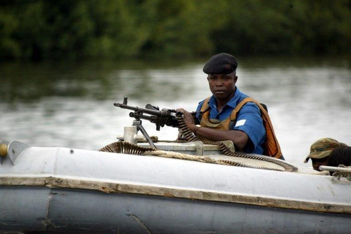 Naval security operatives patrol the creeks of Niger Delta in Buguma.