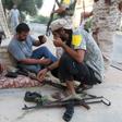 Fighters from Libyan forces allied with the U.N.-backed government load their weapon magazines during a battle with Islamic State fighters in Sirte, Libya August 21, 2016. Picture taken August 21, 2016.