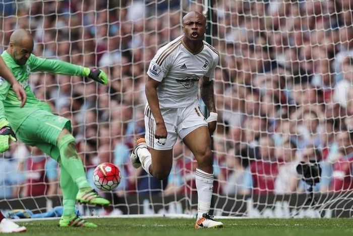Andre Ayew celebrates scoring the second goal for Swansea