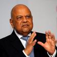 Finance Minister Pravin Gordhan gestures during his address at a business summit in Sandton, South Africa, September 13, 2016.