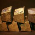 Gold bars are displayed at South Africa's Rand Refinery in Germiston May 30, 2006. REUTERS/Siphiwe Sibeko