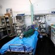 A patient lies on a bed as she receives treatment at Tripoli Central Hospital in Tripoli, Libya July 18, 2016. Picture taken July 18, 2016.
