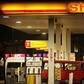 A customer waits to be attended to at a petrol station in Soweto March 11, 2009.  REUTERS/Siphiwe Sibeko