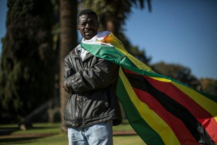 Zimbabwe's national flag became a symbol of anti-government protests after evangelical pastor Evan Mawarire (not pictured) posted a video in April in which he appeared with the flag wound around his neck