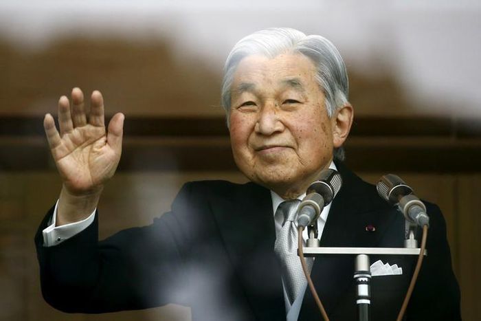 Japan's Emperor Akihito waves to well-wishers who gathered at the Imperial Palace to mark his 82nd birthday in Tokyo, Japan, December 23, 2015.