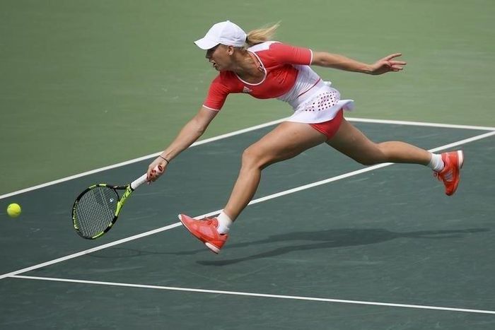 Former world No.1 Wozniacki knocked out