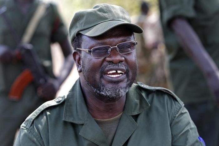Riek Machar, South Sudan's then rebel leader, talks to his men in a rebel-controlled territory in Jonglei State, South Sudan, in this January 31, 2014 file photo.