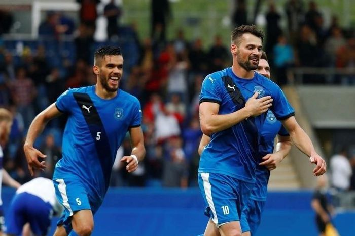 Kosovo's Albert Bunjaku (R) celebrates his goal during Kosovo's first official international soccer friendly.