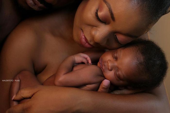 Deyemi Okanlawon, his wife and son