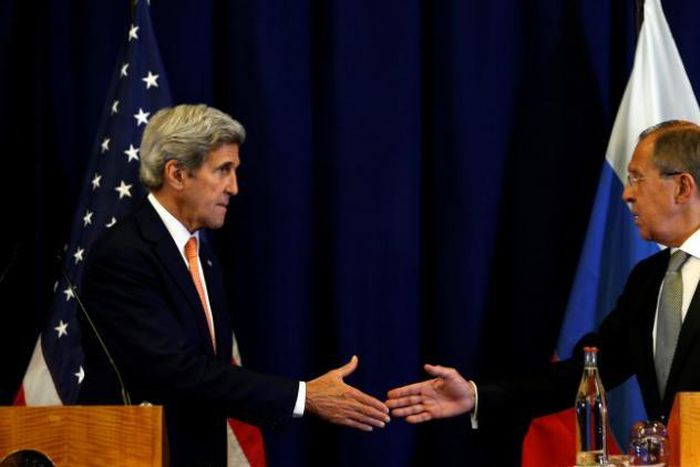 U.S. Secretary of State John Kerry and Russian Foreign Minister Sergei Lavrov (R) shake hands at the conclusion of their news conference following their meeting in Geneva, Switzerland where they discussed the crisis in Syria on September 9, 2016.