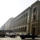 Vehicles drive by in front of Central Bank of Egypt Headquarters in Cairo December 30, 2012.    REUTERS/Amr Abdallah Dalsh