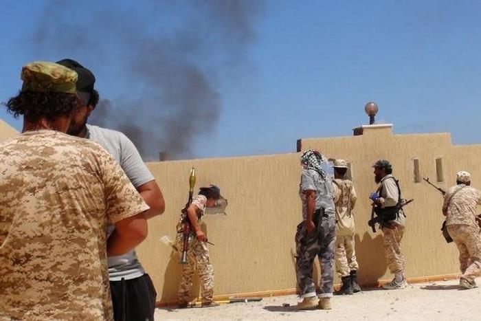Libyan forces allied with the U.N.-backed government take position as they battle with IS fighters to capture university buildings in Sirte, Libya, August 10, 2016. Picture taken August 10, 2016.