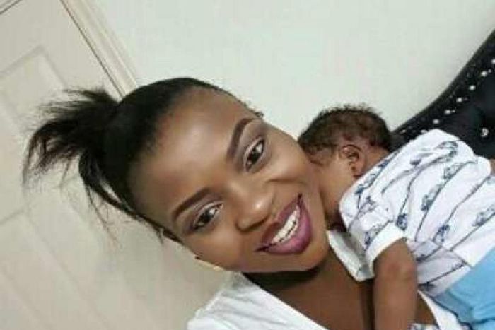 Bimbo Thomas and baby boy