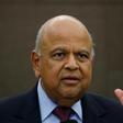 South African Finance Minister Pravin Gordhan reacts during a media briefing in Sandton near Johannesburg, South Africa, March 14, 2016.