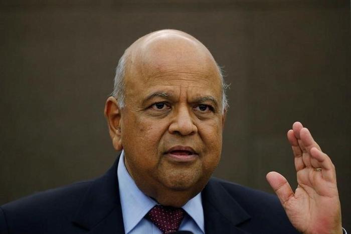 South African Finance Minister Pravin Gordhan reacts during a media briefing in Sandton near Johannesburg, South Africa, March 14, 2016.
