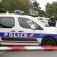 Police cordon off a street in Magnanville, northern France after a man claiming allegiance to the Islamic State group killed two people on June 13, 2016 