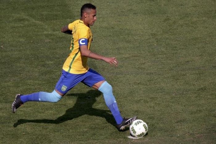 Neymar (BRA) of Brazil kicks a penalty goal against Honduras.
