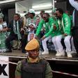 Edgar Lungu (C, in black suit), leader of the Patriotic Front party (PF), dances before addressing his supporters during a rally ahead of Thursday's presidential elections in the capital, Lusaka, Zambia August 10, 2016. REUTERS/Jean Serge Mandela