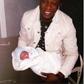 Chuddy K with his new born baby daughter
