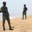 Soldiers stand guard on the beach following an attack by gunmen from al Qaeda's North African branch, in Grand Bassam, Ivory Coast, March 14, 2016. REUTERS/Luc Gnago