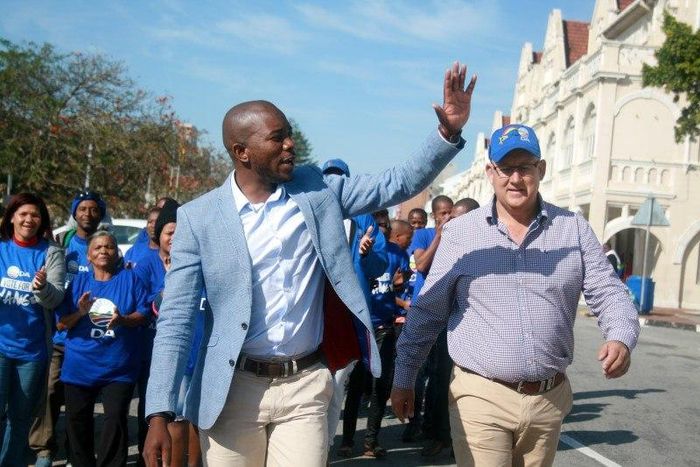 Democratic Alliance leader (D.A), Mmusi Maimane (L) and the mayoral candidate for Nelson Mandela Bay, Athol Trollip wave to their suppoters during their election campaign in Port Elizabeth, August 2,2016. Picture taken August 2, 2016.