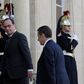 French President Francois Hollande (L) escorts Nicolas Sarkozy, former president and current head of the Les Republicains political party, before a meeting at the Elysee Palace in Paris, France, November 15, 2015.