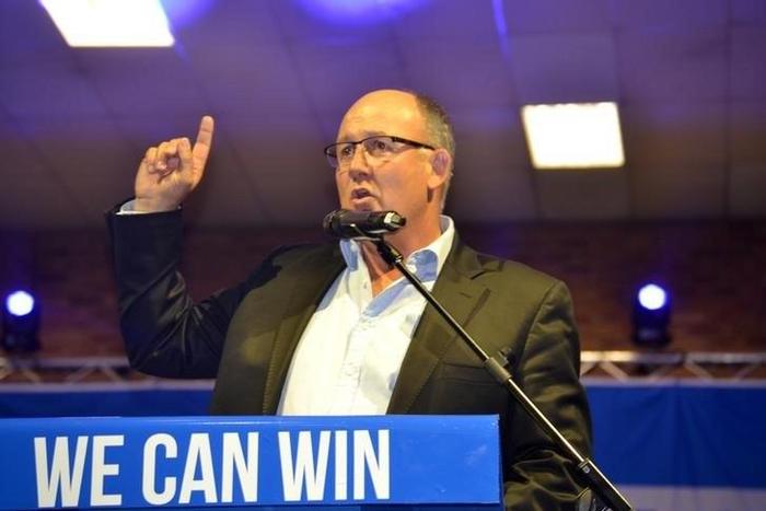 Democratic Alliance Mayoral candidate for the Nelson Mandela Bay munincipality, Athol Trollip gestures during his parties election campaign in Port Elizabeth, South Africa, July 24, 2016.
