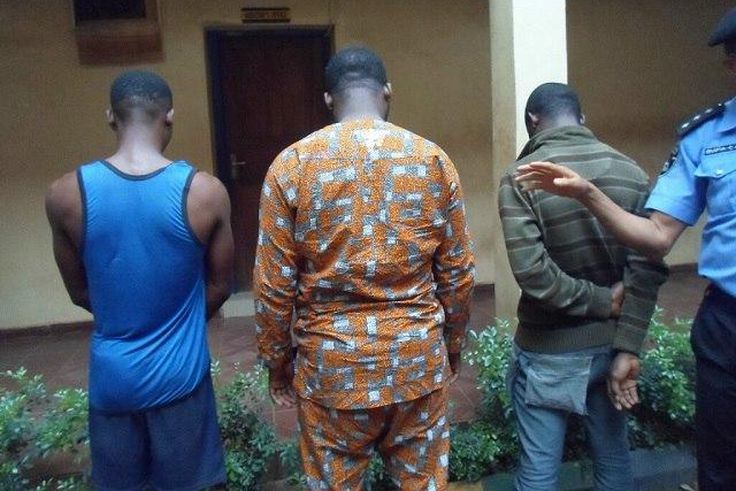 The suspects, with Ogbonnaya Odi in the middle