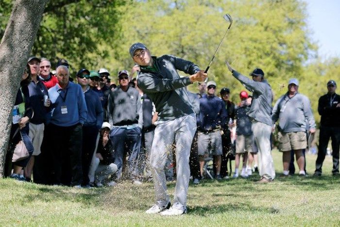 Mar 24, 2016; Austin, TX, USA; Jordan Spieth of the United States hits out of the rough during the second round of the World Golf Championship-Dell Match Play at the Austin Country Club. Erich Schlegel-USA TODAY Sports