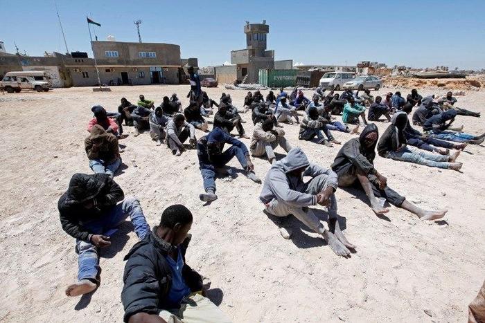 Migrants, who attempted to flee the Libyan coast to head for Europe, are seen after being detained at the coast guard center in the coastal city of Tripoli, Libya, May 16, 2016.