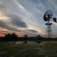 A windmill pumps water from a borehole near Graaf Reinet in the Karoo October 11, 2013. REUTERS/Mike Hutchings NG HUTCHINGS'