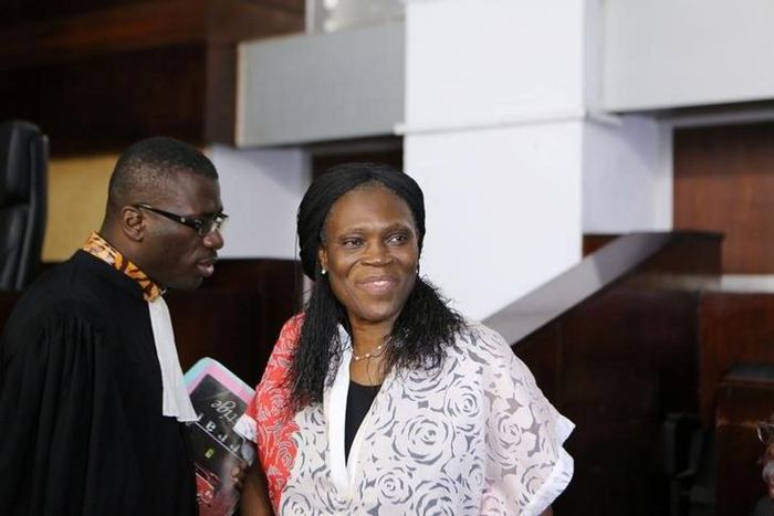 Ivory Coast's former first lady Simone Gbagbo (R), who is accused of crimes against humanity and war crimes for her alleged role in a 2011 civil war, arrives in a domestic court in Abidjan, Ivory Coast, May 31, 2016.
